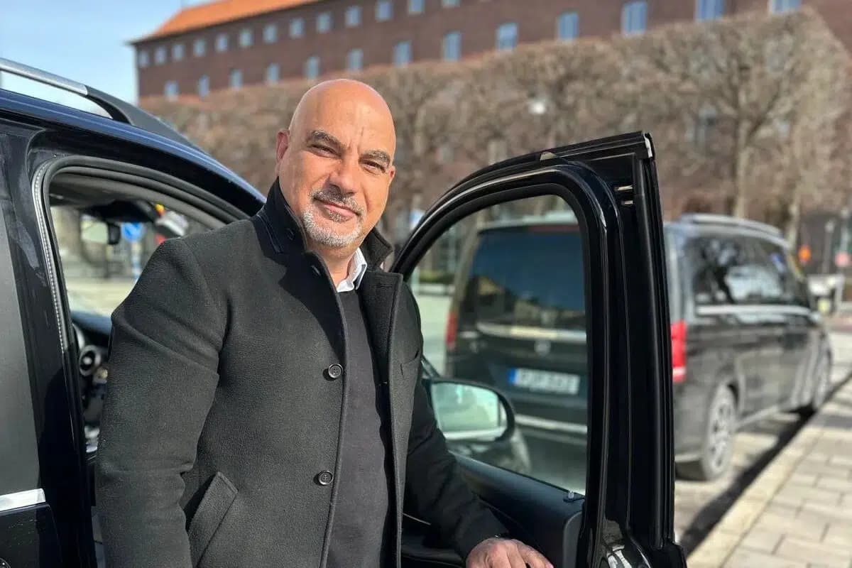 Bill Chehade, founder of Leading Car Service, by a Mercedes V-Class